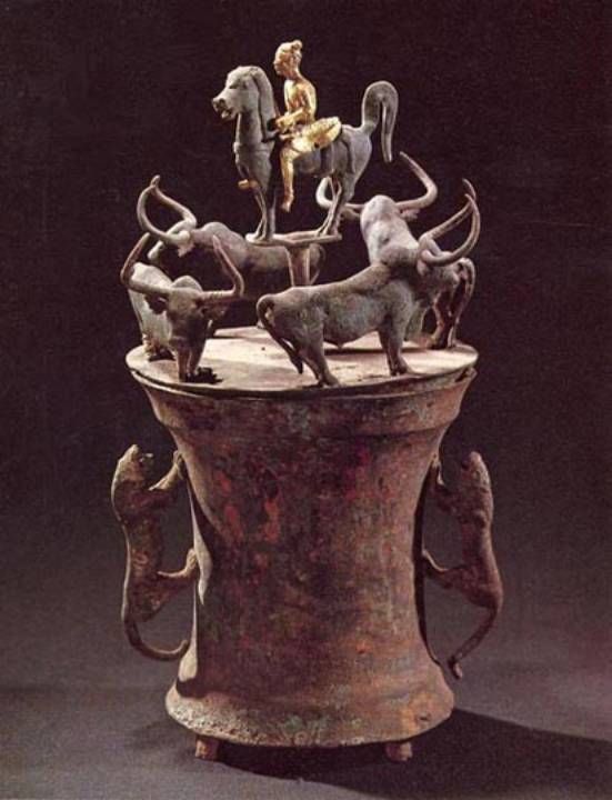 Imagine the bulls walking in a circle turning a mandrel at the center.
                                      The brim of a container represents the horizontal plane and the portal to a higher
                                      density.