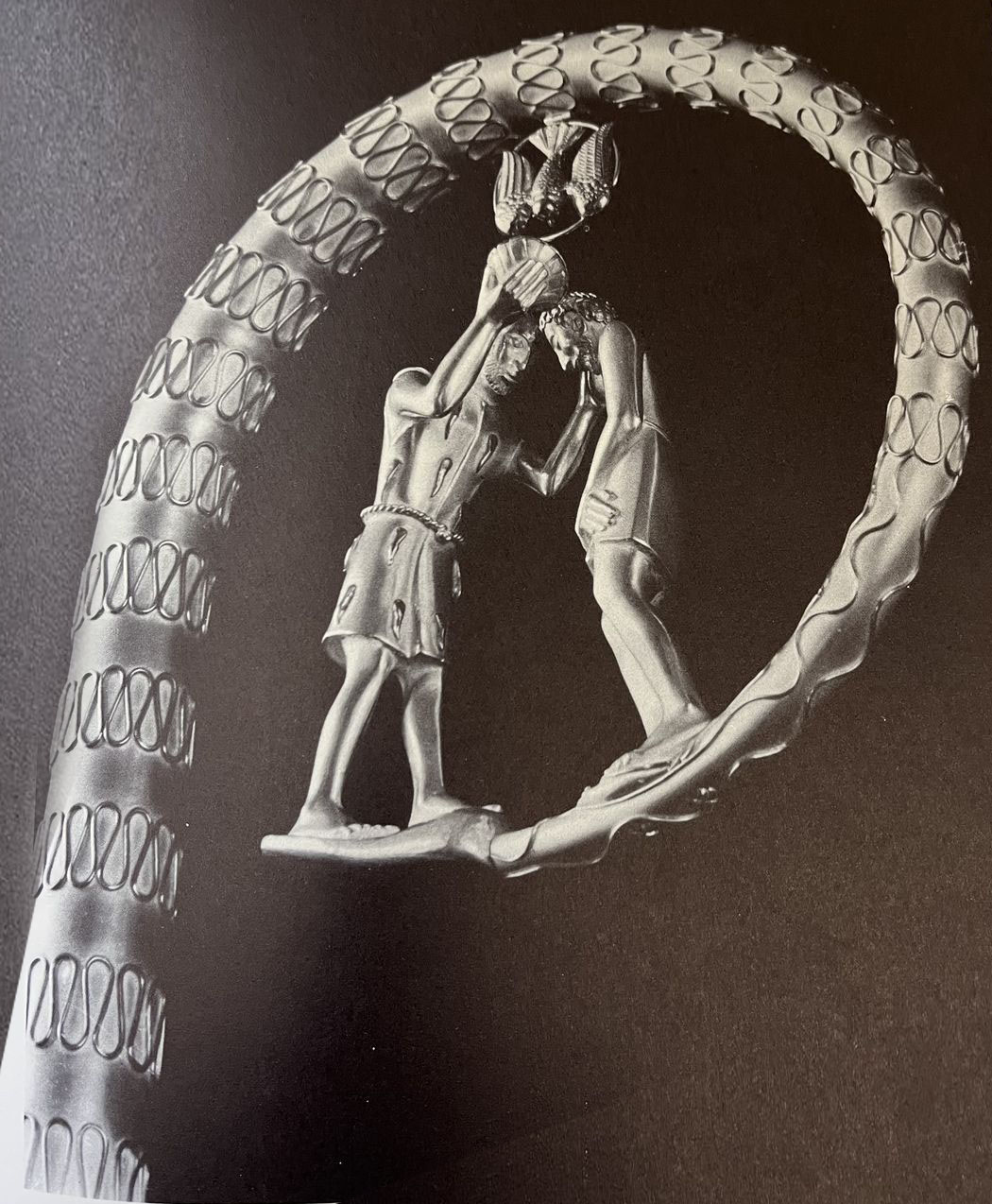 Crozier is a portal symbol meaning downward, or bidirectional favoring downward.