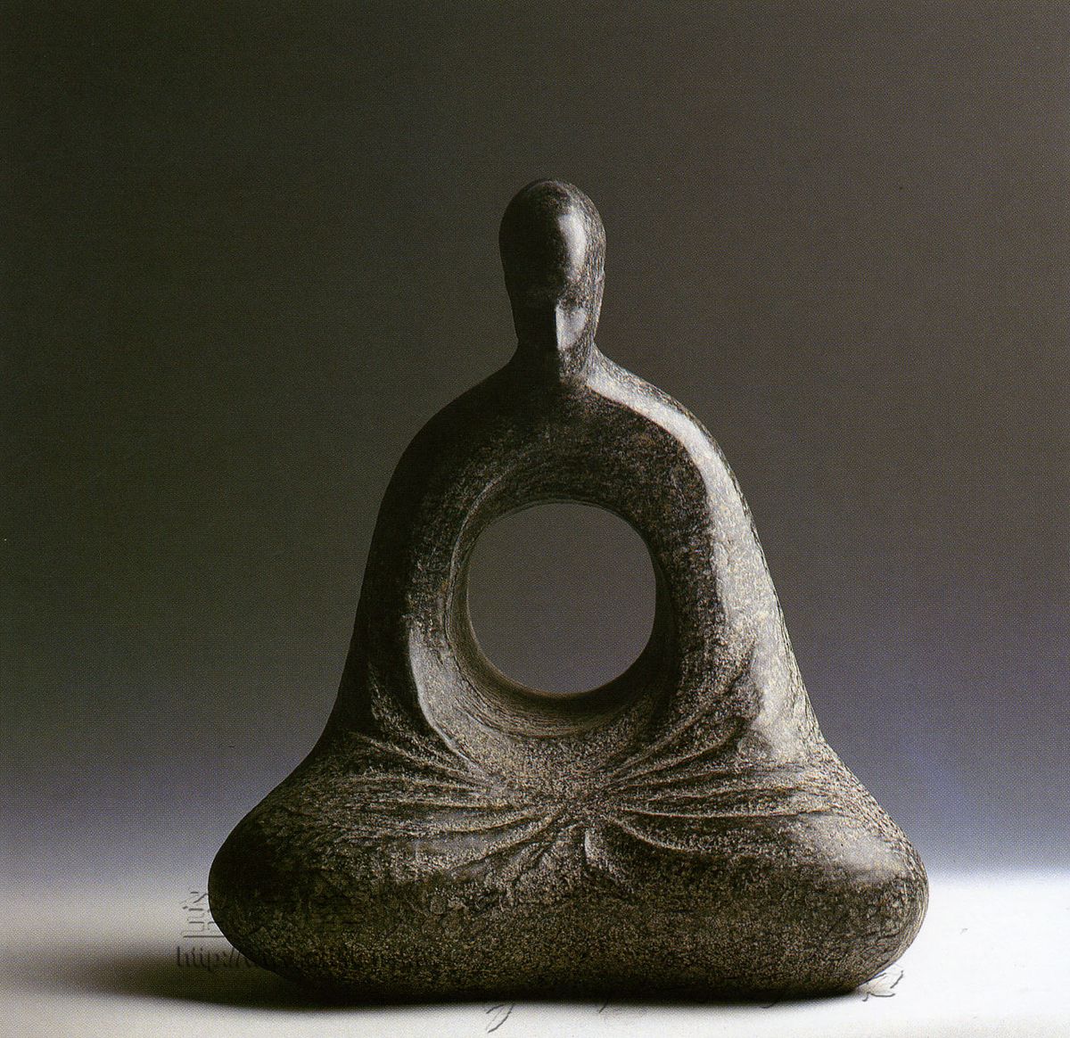 When a person-symbol represents a torus, its core can show a void.